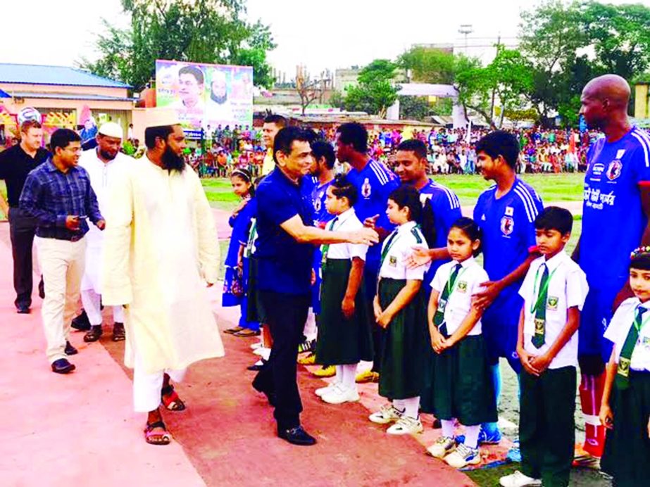 BFF President Kazi Salahuddin being introduced with the players of the final match of Protest Football Tournament 2016 between Aligang Club and Nayamati Football Club held at Narayanganj on Friday.