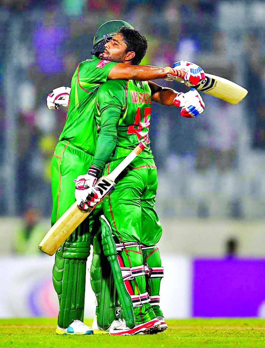 Imrul Kayes is congratulated on reaching his hundred during the 1st ODI between Bangladesh and England at Sher-e-Bangla National Cricket Stadium in Mirpur on Friday.
