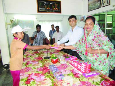 BHANGURA (Pabna): UNO Md Shamsul Alam and headmaster Habiba Khandoker Eva being awarded at Sarutia Govt Primary School at Bhangura recently.