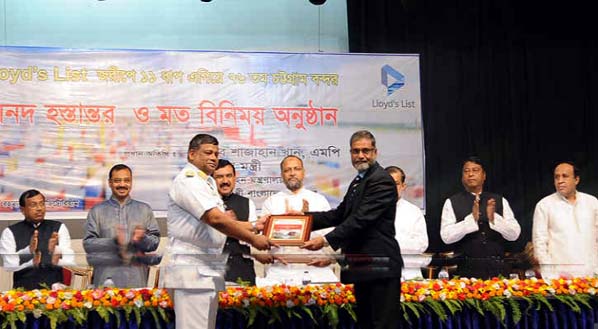 Convenor of Lloyds List of Bangladesh Captain Zillur Rahman handing over the Lloyds Survey Awards to the Chairman of Chittagong Port Authority Rear Admiral M. Khaled Iqbal at a function at Port Auditorium on Friday afternoon . Shipping Minister Md. Sh
