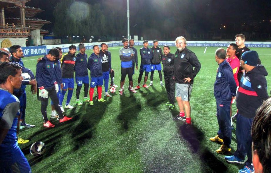 Head Coach of Bangladesh National Football team Tom Saintfiet giving instruction to the booters at Changlimithang Stadium in Thimpu, Bhutan on Saturday.