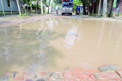 GAFRAGAON(Mymensingh): A view of the dilapidated Mymensingh-Toke Road which needs immediate reconstruction. This picture was taken yesterday.