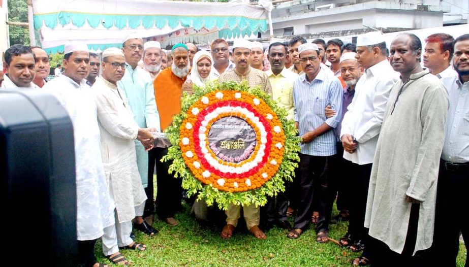 CCC Mayor A J M Nasir Uddin placing wreaths at the graveyard of Ataur Rahman, former General Secretary, Chittagong City Awami League recently.