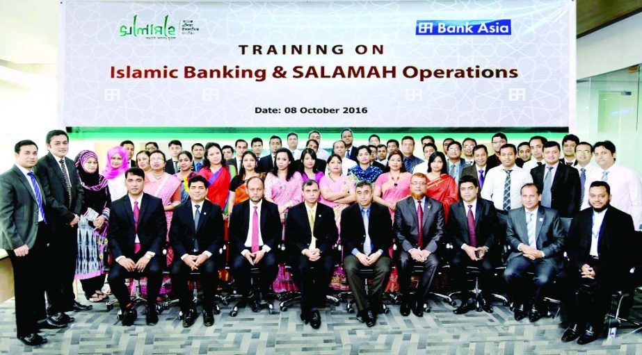 Md Shahabullah, Head of Agrabad Branch of Bank Asia, poses with the participants of a training on 'Islamic Banking and Salamah Operations' for its Chittagong region officers on Sunday at the Branch Bhaban. Senior Vice Presidents AKM Shaiful Islam Chowdh