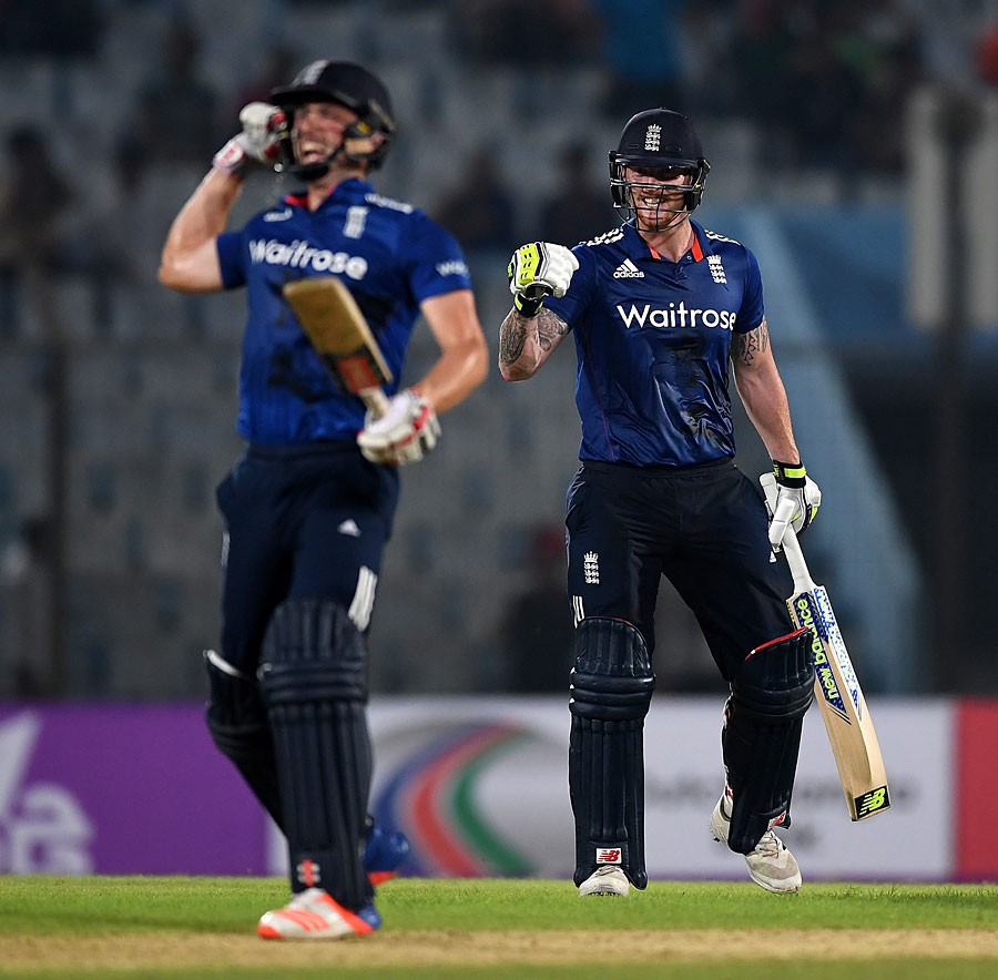 Chris Woakes and Ben Stokes celebrate the winning moment during the third ODI between Bangladesh and England at Zahur Ahmed Chowdhury Stadium in Chittagong on Wednesday.