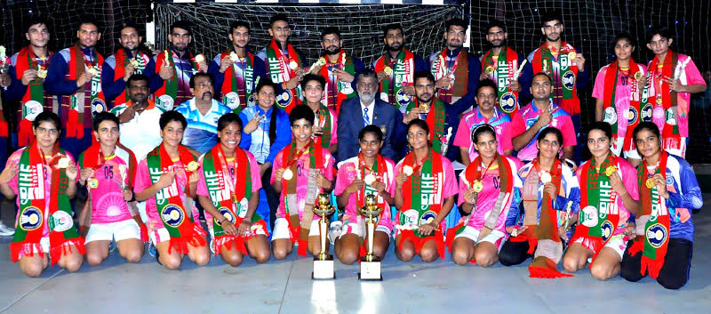 Indian men's team and women's team, the champions of the men's group and women's group of the International Handball Federation (IHF) Trophy pose for a photo session at the Shaheed (Captain) M Mansur Ali National Handball Stadium on Thursday.