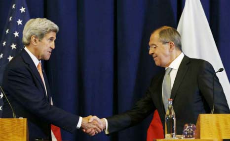 US Secretary of State John Kerry (L) and Russian Foreign Minister Sergei Lavrov shake hands as they agreed a plan to impose a ceasefire in the Syrian civil war and lay the foundation of a peace process.