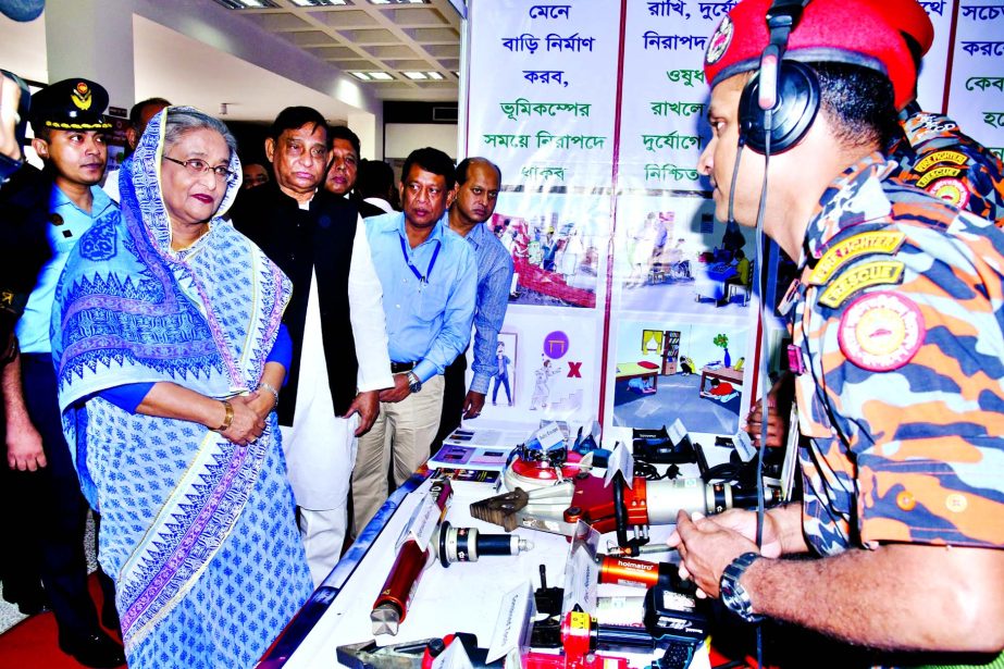 Prime Minister Sheikh Hasina visiting different cyclone and flood centres which she inaugurated digitally at the Osmani Memorial Auditorium marking the International Day of Disaster Reduction 2016 on Thursday.