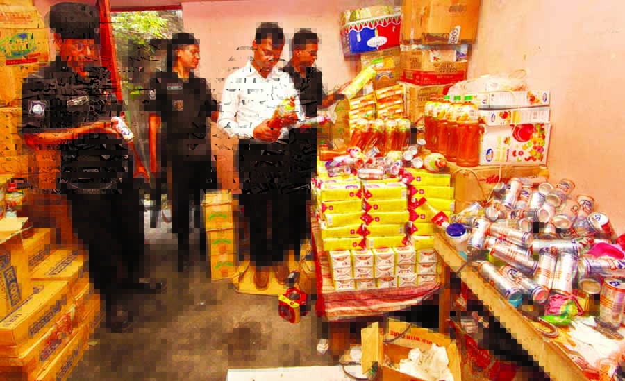 A RAB-3 mobile court led by Executive Magistrate conducted a raid and seized huge date-expired foreign food items and cosmetics from City's North Badda area on Thursday.