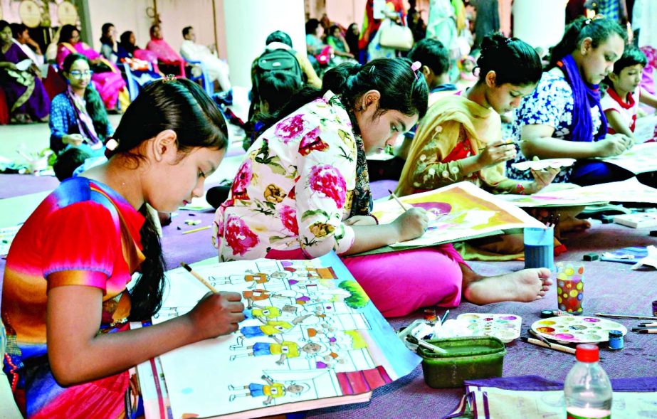 Children of Kendriya Khelaghar Ashar engrossed in painting at a drawing competition at the premises of Shilpakala Academy in the city on Friday marking International Day for Children.