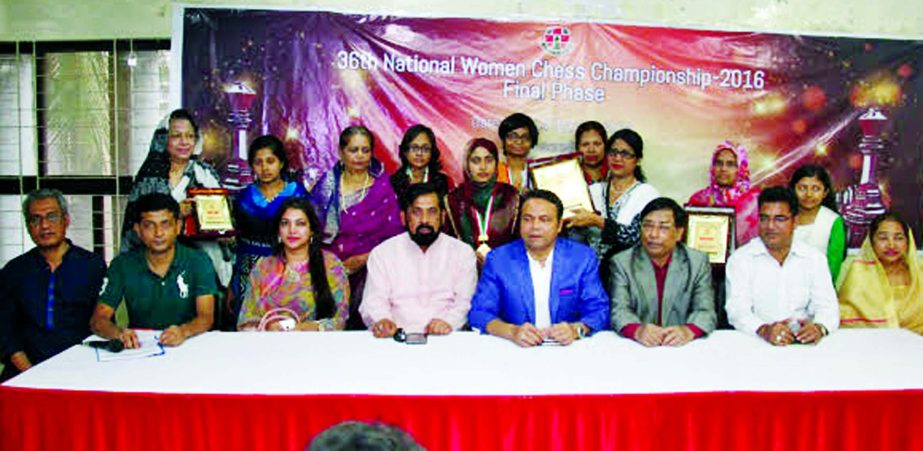 The winners of the Saif Global Sports 36th National Women's Chess Championship and the officials of Bangladesh Chess Federation pose for a photo session at Bangladesh Chess Federation hall-room on Friday.