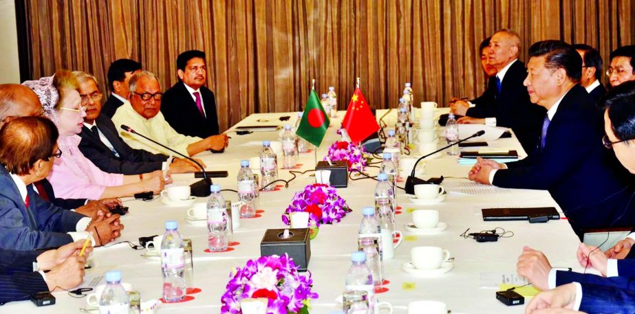 Visiting Chinese President Xi Jinping holding a meeting on bilateral issues with BNP Chairperson Begum Khaleda Zia at Hotel Le Meridien in the city on Friday evening.
