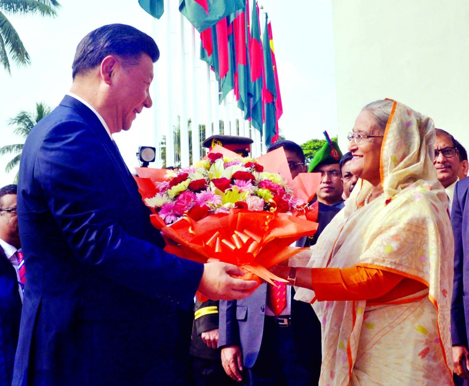 Prime Minister Sheikh Hasina welcomes Chinese President Xi Jinping at her office on Friday.