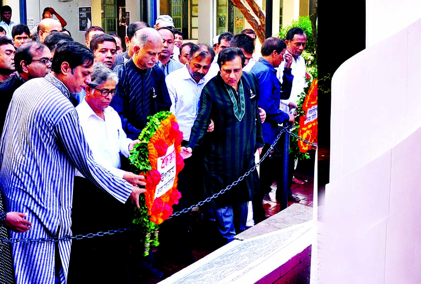 Dhaka University Vice-Chancellor Prof Dr AAMS Arefin Siddique along with teachers and students placing floral wreaths on October Memorial of the university on Saturday marking DU Mourning Day.