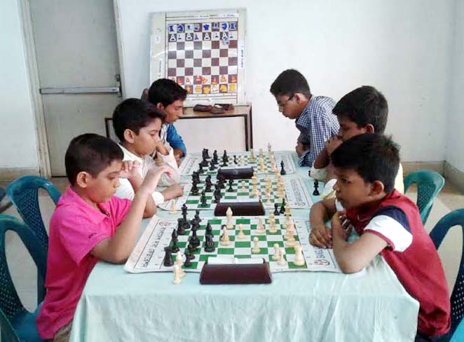 The participants of the grass-root level talent hunt chess training and selection progrmme are in action at the auditorium of National Sports Council Tower on Saturday.
