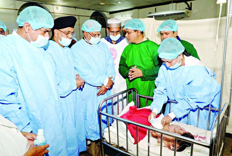 A team of DMCH doctors examining the new-born conjoined babies found abandoned in the Labour Unit of the hospital on Saturday.