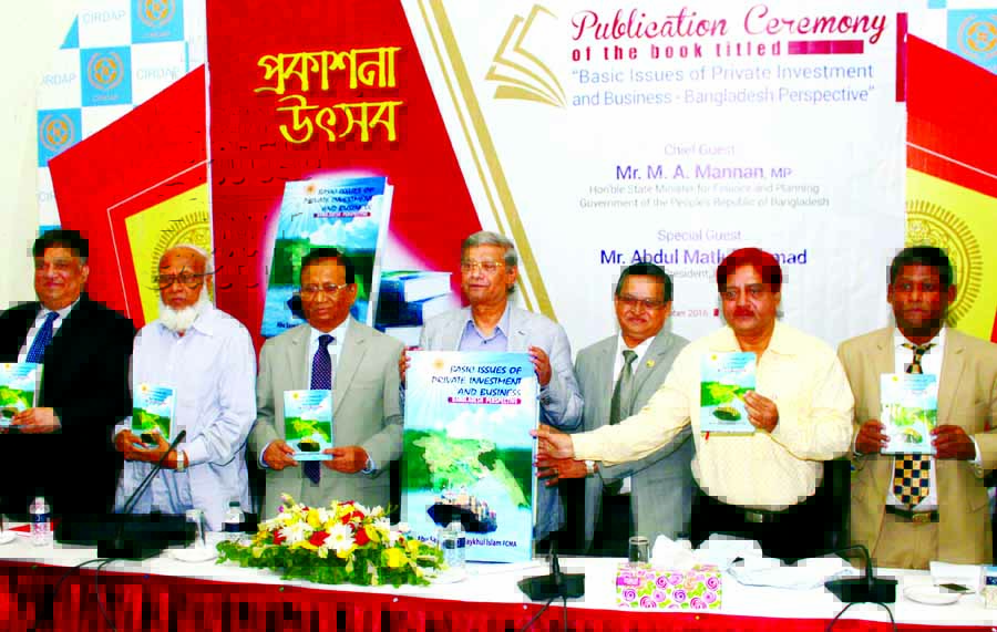 State Minister for Finance MA Mannan along with other distinguished persons holds the copies of a book titled 'Basic Issues of Private Investment and Business: Bangladesh Perspective' at its cover unwrapping ceremony in CIRDAP auditorium in the city on