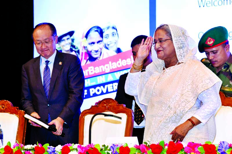 Prime Minister Sheikh Hasina and World Bank President Dr Jim Yong Kim at a function at Osmani Memorial Auditorium marking the International Day for the Eradication of Poverty on Monday.