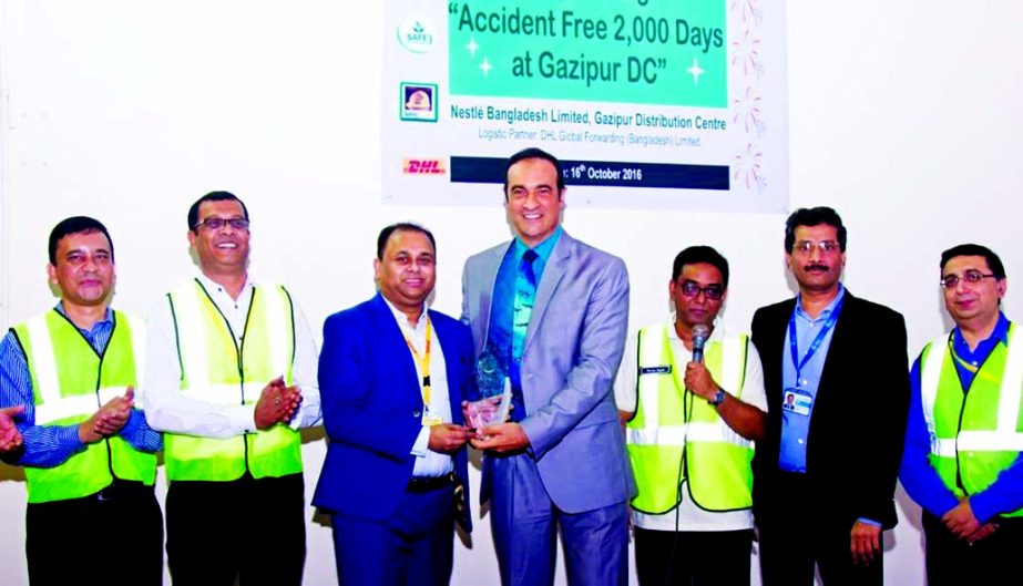 NestlÃ© Bangladesh Celebrated "Accident Free 2000 Days at Gazipur DC" recently. StÃ©phane NordÃ©, Managing Director, NestlÃ© Bangladesh Ltd recently presented a memento of appreciation to M. Nooruddin Chowdhury, Country Manager, DHL Global Forwa