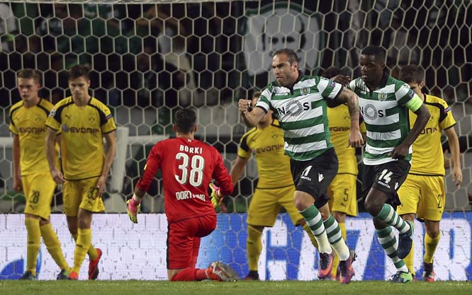 Sporting's Bruno Cesar celebrates after scoring his side's first goal during a Champions League, Group F soccer match between Sporting and Borussia Dortmund at the Alvalade stadium in Lisbon on Tuesday.