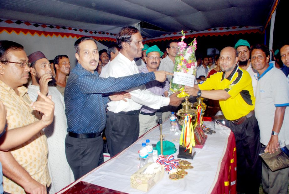 Additional General Manager (East) Mohd. Esa-E-Khalil and Chief Commercial Manager Sarder Shahadat Ali distributing prizes among the winners of 12th Inter Divisional Football Champion of Bangladesh Railway on Thursday.