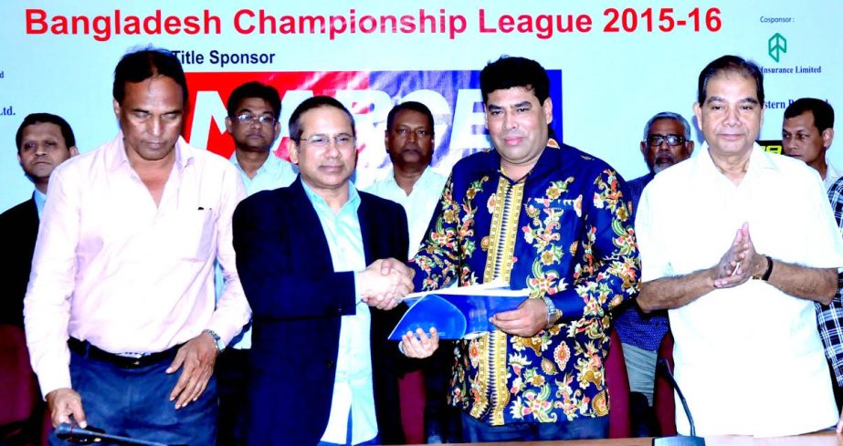 BFF Senior Vice-president Abdus Salam Murshedy and Additional Director of Walton FM Iqbal Bin Anwar Dawn shaking hand after signed the contract at the conference room of Bangladesh Football Federation on Monday.