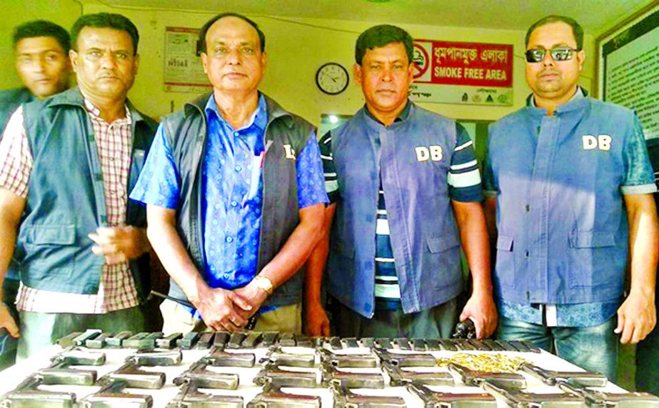 Police on Monday recovered 22 pistols along with hundreds of bullets from a house at Chapainawabganj in Rajshahi. This photo was taken from Sankarbali Mohalla. Two people have been detained in this connection.
