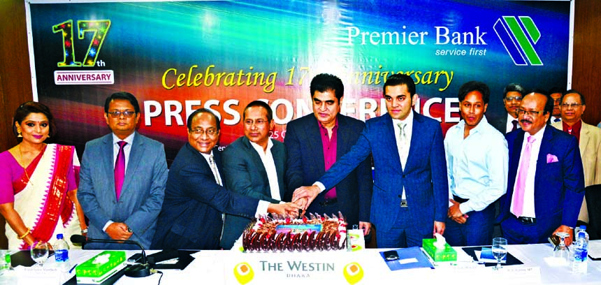 Dr HBM Iqbal, Chairman and Abdus Salam Murshedy, Director of Premier Bank Ltd are seen in the 17th anniversary programme of the bank held on Tuesday in the city. High officials of the bank were also present in the ceremony.