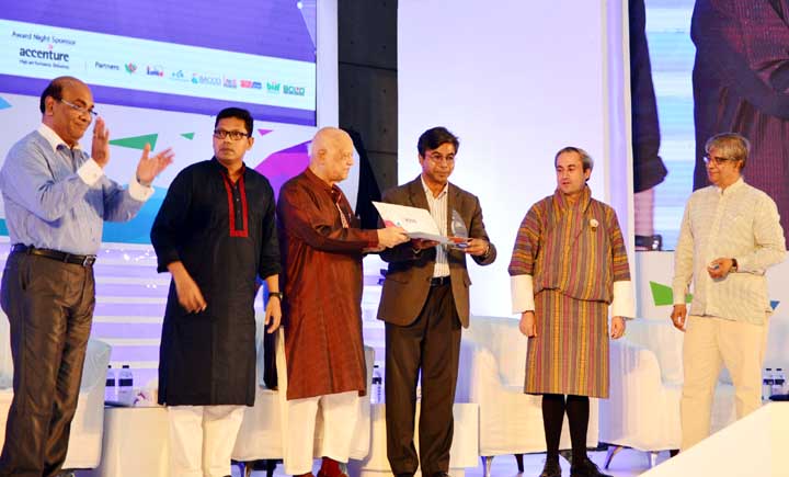 Finance Minister Abul Maal Abdul Muhith hands over "National ICT Award 2016"" to Prof Dr Syed Akhter Hossain evaluating his outstanding contribution to ICT Education at the Digital World-2016 Award Night on Saturday."