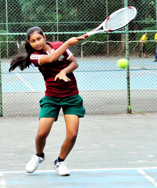 A scene from the match of the Euro Group UCL National and Inter-Club Tennis Competition at the National Tennis Complex in Ramna on Wednesday.