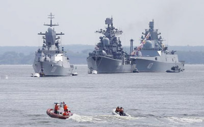 (L-R) Russian navy corvette Steregushchy, destroyer Nastoichivy and frigate Admiral Gorshkov are anchored in a bay of the Russian fleet base in Baltiysk in Kaliningrad region, Russia
