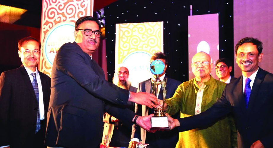 Neeraj Akhouri, Chief Executive Officer of Lafarge Surma Cement Limited, received the first prize in the cement category at 'ICMAB Best Corporate Awards-2015' from Finance Minister Abul Maal Abdul Muhith, MP. held in the city recently. Masud Khan, Chief