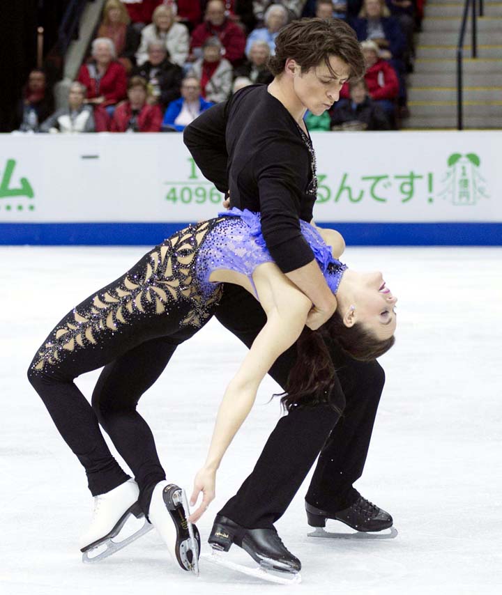 Tessa Virtue and Scott Moir of Canada perform in the ice dance short program during the Skate Canada figure skating event in Mississauga, Ontario on Friday.