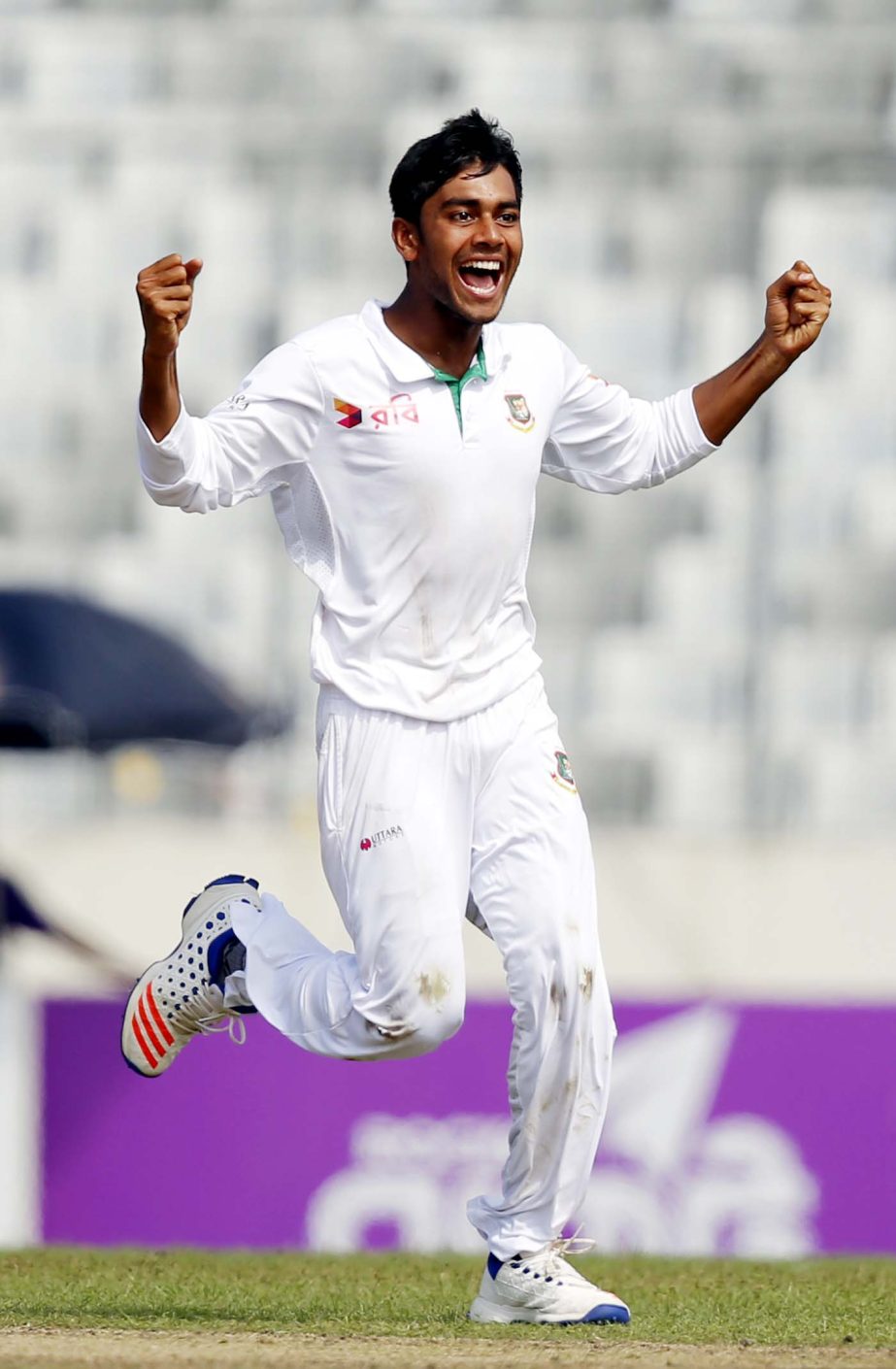 Bangladesh's Mehedi Hasan Miraz celebrates the dismissal of England's Jonny Bairstow during their second day of the second cricket test match in Dhaka, Bangladesh on Saturday.