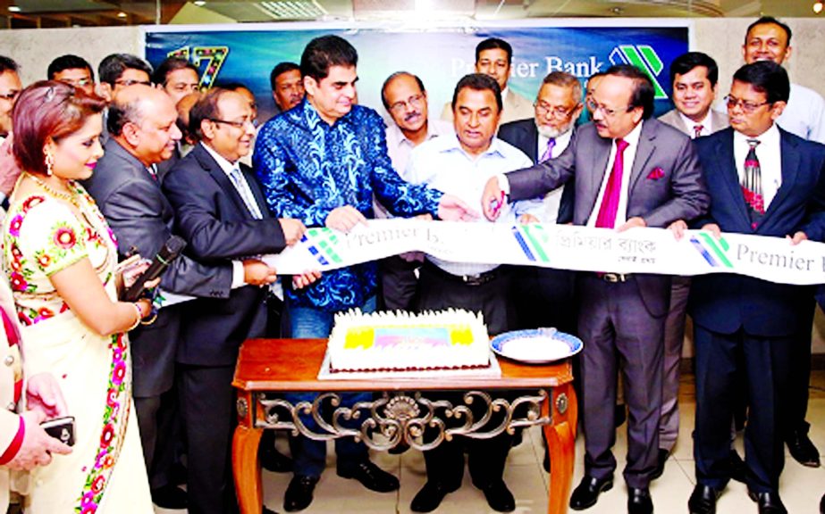 AHM Mustafa Kamal, Planning Minister, inaugurating the 17th anniversary of Premier Bank Ltd, at the bank's head office in the city recently. Dr HBM Iqbal, Chairman, Md Ehsan Khasru, Advisor, Khondker Fazle Rashid, Managing Director and high officials of