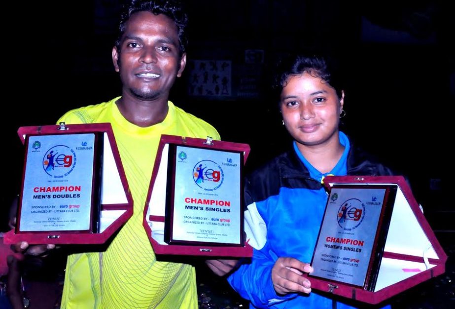 Amol Roy (left) and Ishita Afroj pose with their trophies on Monday. They became champions in boys and girls singles group of the Euro Group-UCL National and Inter-Club Tennis Tournament.