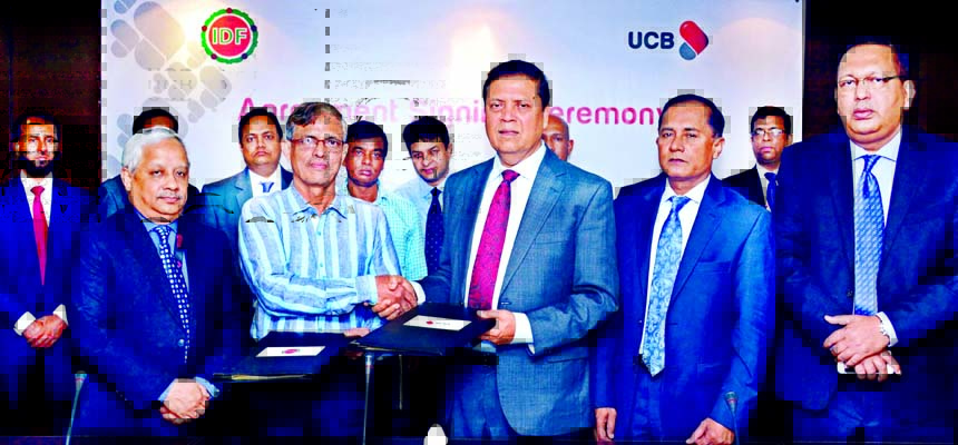 United Commercial Bank Limited (UCB) signs a memorandum of understanding with Integrated Development Foundation (IDF) for distribution of inward foreign remittance across the country on Tuesday in the city. Muhammed Ali, Managing Director of UCB & Zahirul