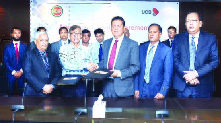 United Commercial Bank Limited (UCB) signs a memorandum of understanding with Integrated Development Foundation (IDF) for distribution of inward foreign remittance across the country on Tuesday in the city. Muhammed Ali, Managing Director of UCB & Zahirul