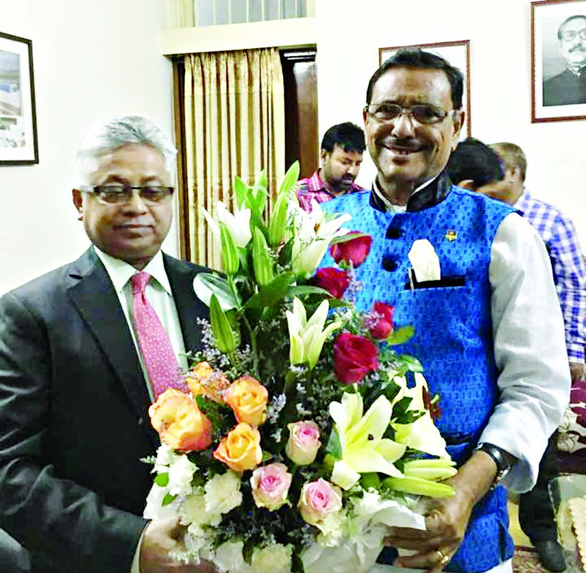 Nizam Chowdhury, Senior Joint Secretary, US Awami League and founder Chairman NRB Global Bank Ltd greeting newly-elected General Secretary of Bangladesh Awami League and Minister for Road Transport and Bridges Obaidul Quader at the office of the Presi