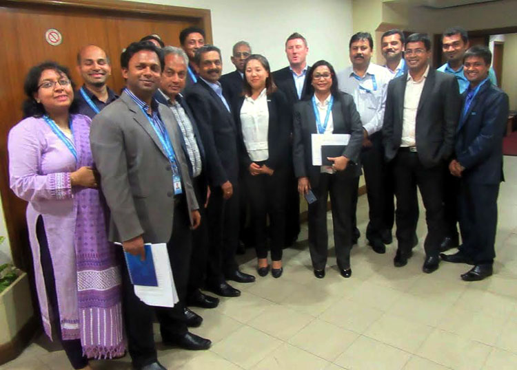 The FIFA, AFC delegates and the officials of Bangladesh Football Federation (BFF) pose for a photo session after discussion at the BFF House on Wednesday.