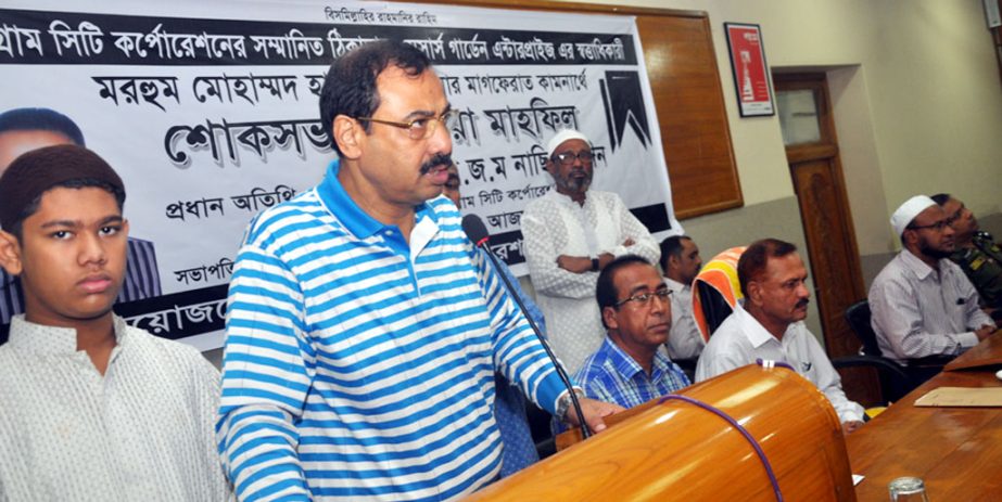 CCC Mayor A J M Nasir Uddin speaking at a memorial meeting of Awami League leader and contractor Md Hasan as Chief Guest at KB Abdus Sattar Auditorium on Wednesday.