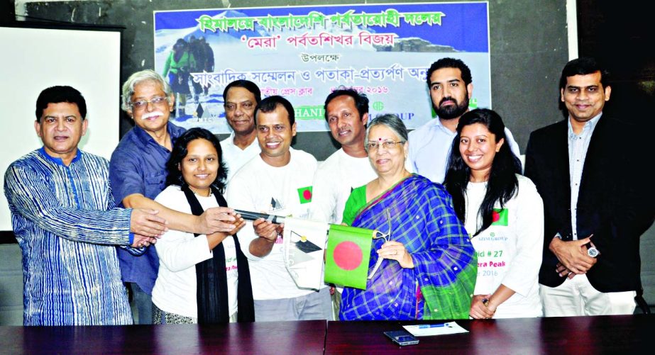 Former Adviser to the Caretaker Government Sultana Kamal, among others, at the flag handing over ceremony for the best mountaineers of Bangladesh organised by Bangla Mountaineering and Trekking Club at the Jatiya Press Club on Friday.