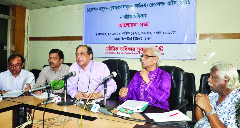 Prof Swadhin Malik speaking at a discussion on 'Foreign Donation (Voluntary Programmes) Regulation Law, 2016 and Citizens' Rights' organised by Committee for Protecting Fundamental Rights at Dhaka Reporters Unity on Friday.