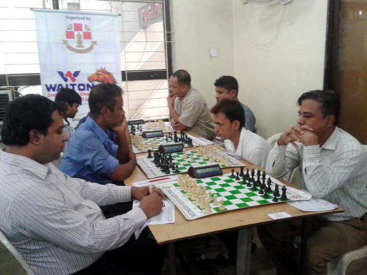 A scene from the 3rd round games of the Walton Second Division Chess League at Bangladesh Chess Federation hall-room on Saturday.