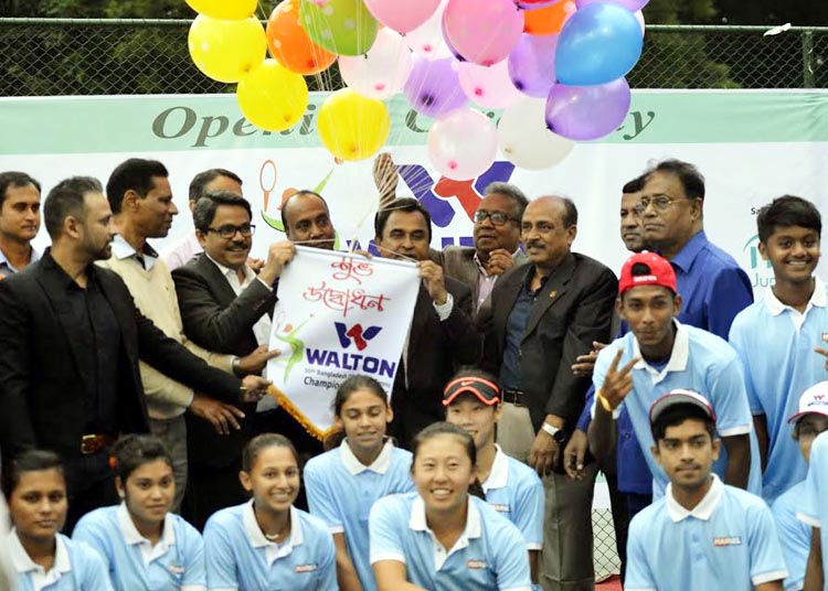 Minister for Planning AHM Mustafa Kamal inaugurating the Walton International Junior Tennis Championship by releasing the balloons as the chief guest at the National Tennis Complex in Ramna on Sunday.