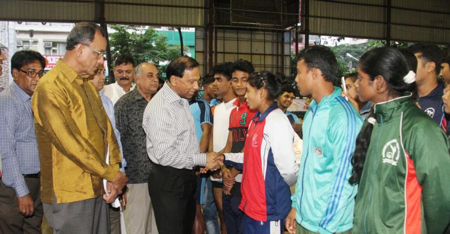 Newly elected Secretary of Youth and Sports of Awami League Central Committee Harun-or-Rashid being introduced with the participants of the opening day of the Ifad 32nd Men's & 6th Women's National Wrestling Competition at the Shaheed (Captain) M Mansur