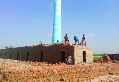 DINAJPUR: Officials of district administration evicted an illegal brickfield at Parbatipur Pourashava. This snap was taken on Saturday.