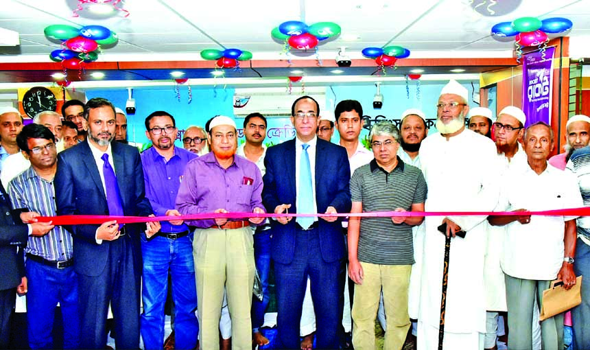Md Sayedul Hasan, Deputy Managing Director of Dutch-Bangla Bank Ltd, inaugurates the bank's Mohammadpur Branch in the city on Tuesday. Local elites, businessmen and high officials of the bank were present in the occasion among others.