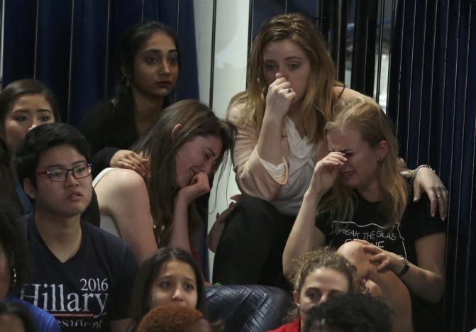 Supporters of Hillary Clinton react at her election night rally in Manhattan. REUTERS/Lucy Nicholson