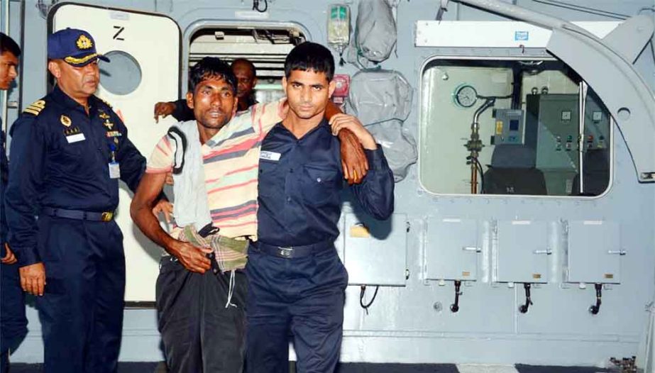 Members of Bangladesh Navy rescued fishermen on Tuesday.